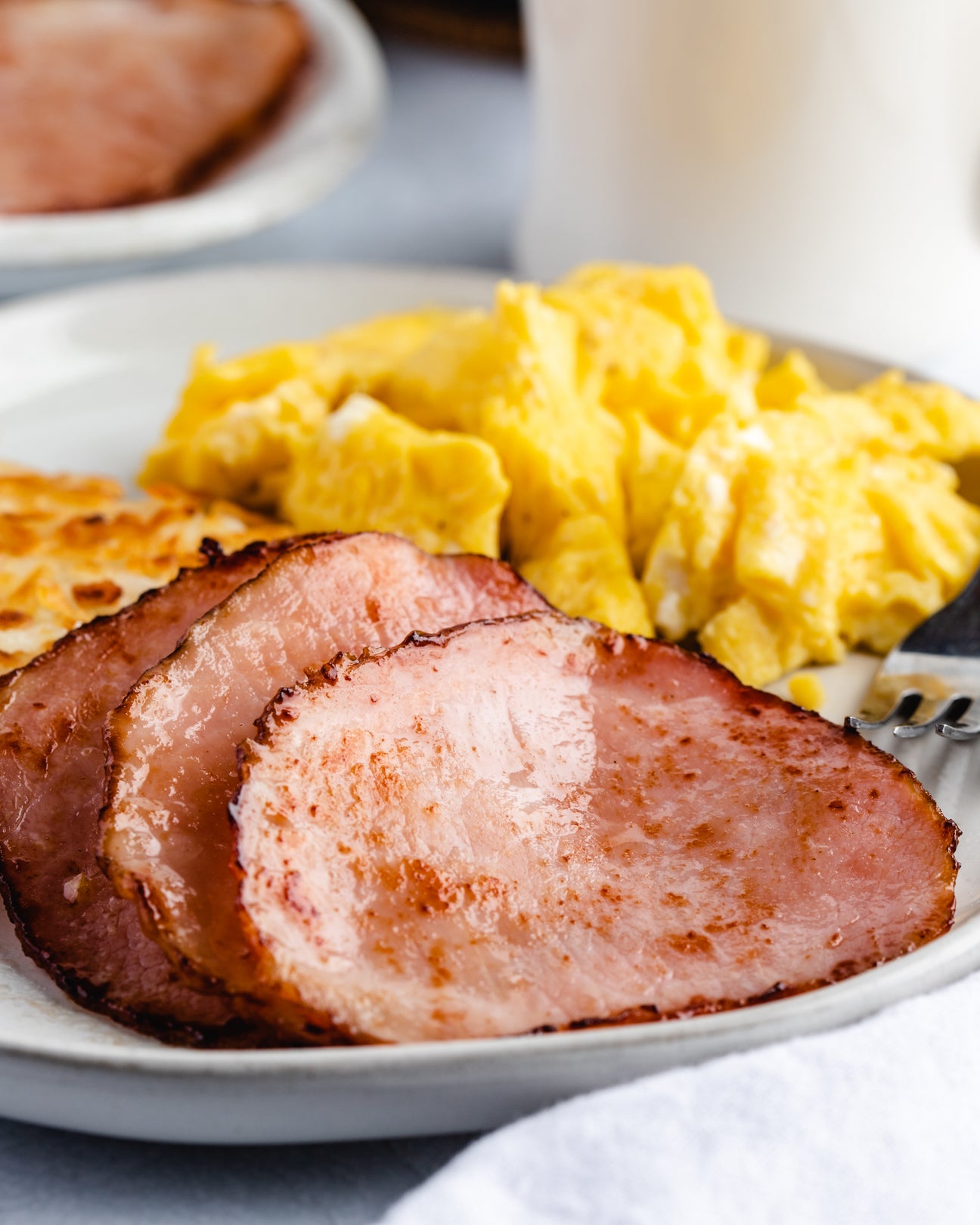 Canadian Bacon on a Breakfast Plate with eggs