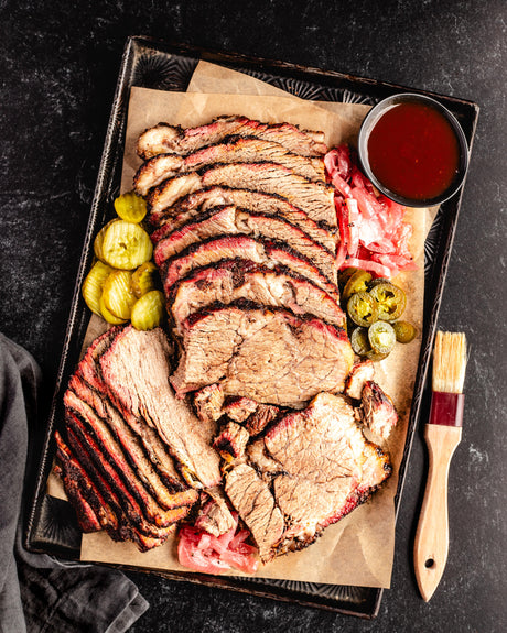 sliced brisket with barbeque sauce