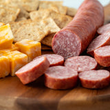 sliced smoked sausage with cheese and crackers
