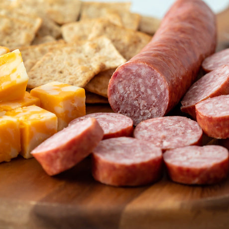 sliced smoked sausage with cheese and crackers