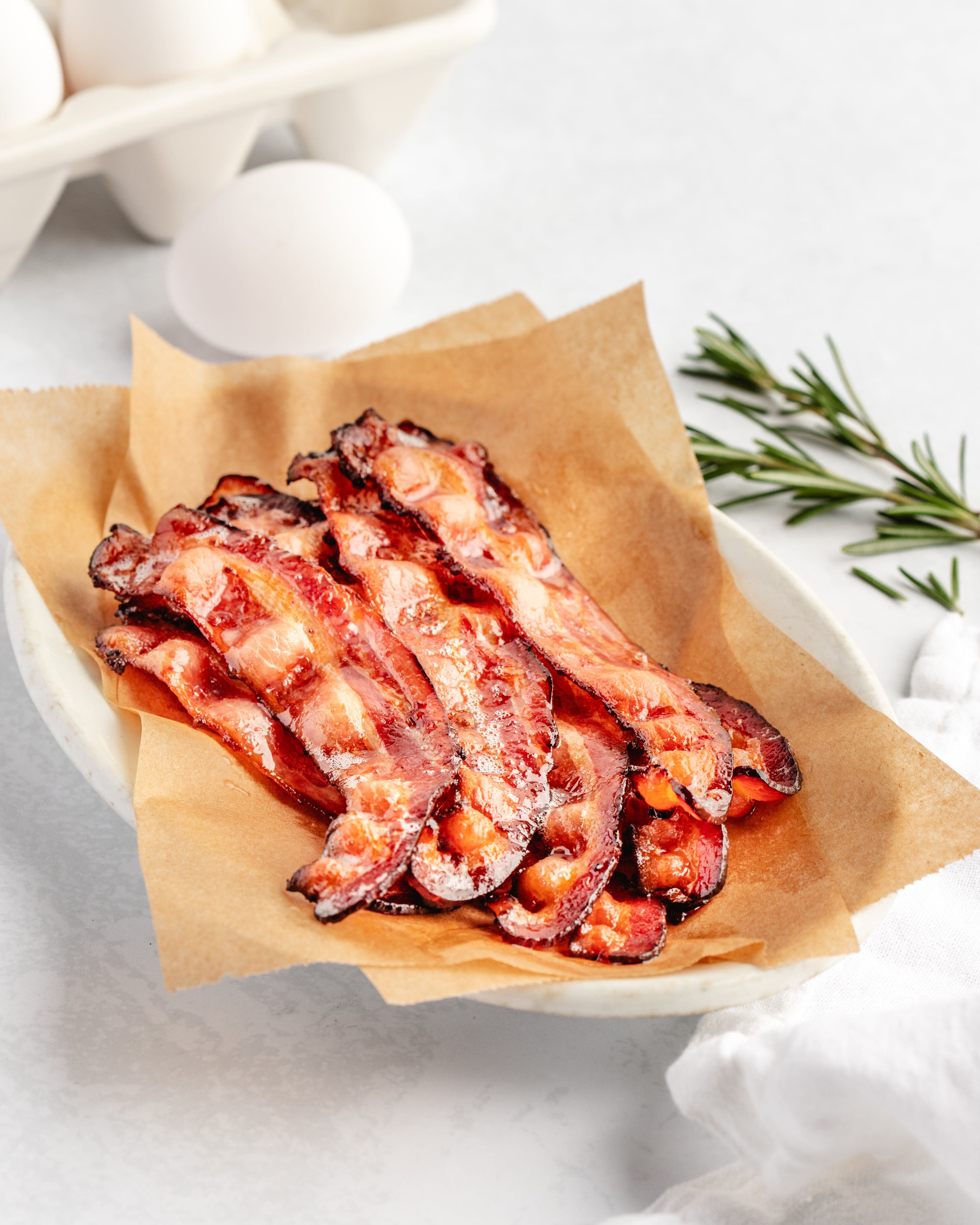 fried bacon arrayed on a plate
