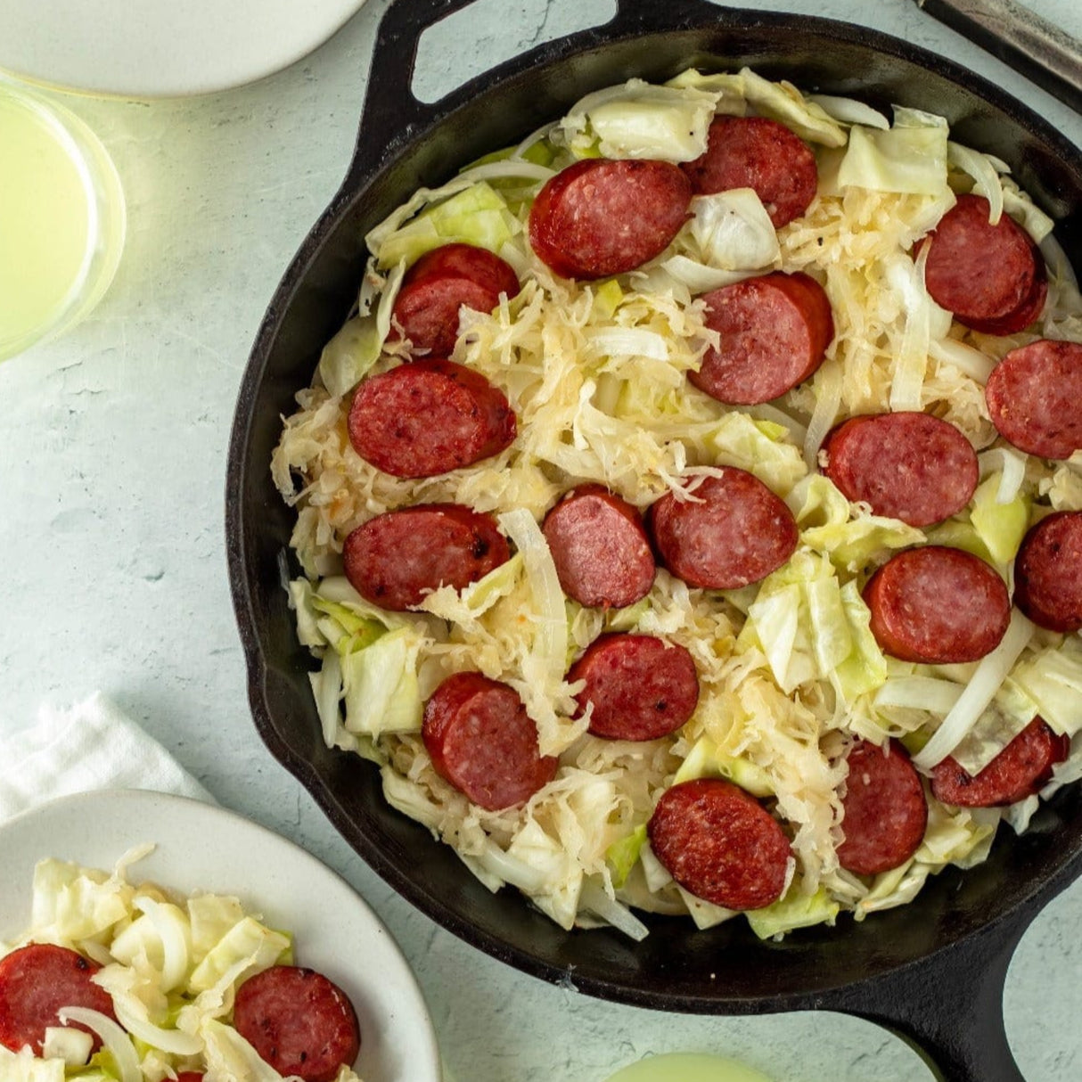 sliced smoked sausage in cabbage