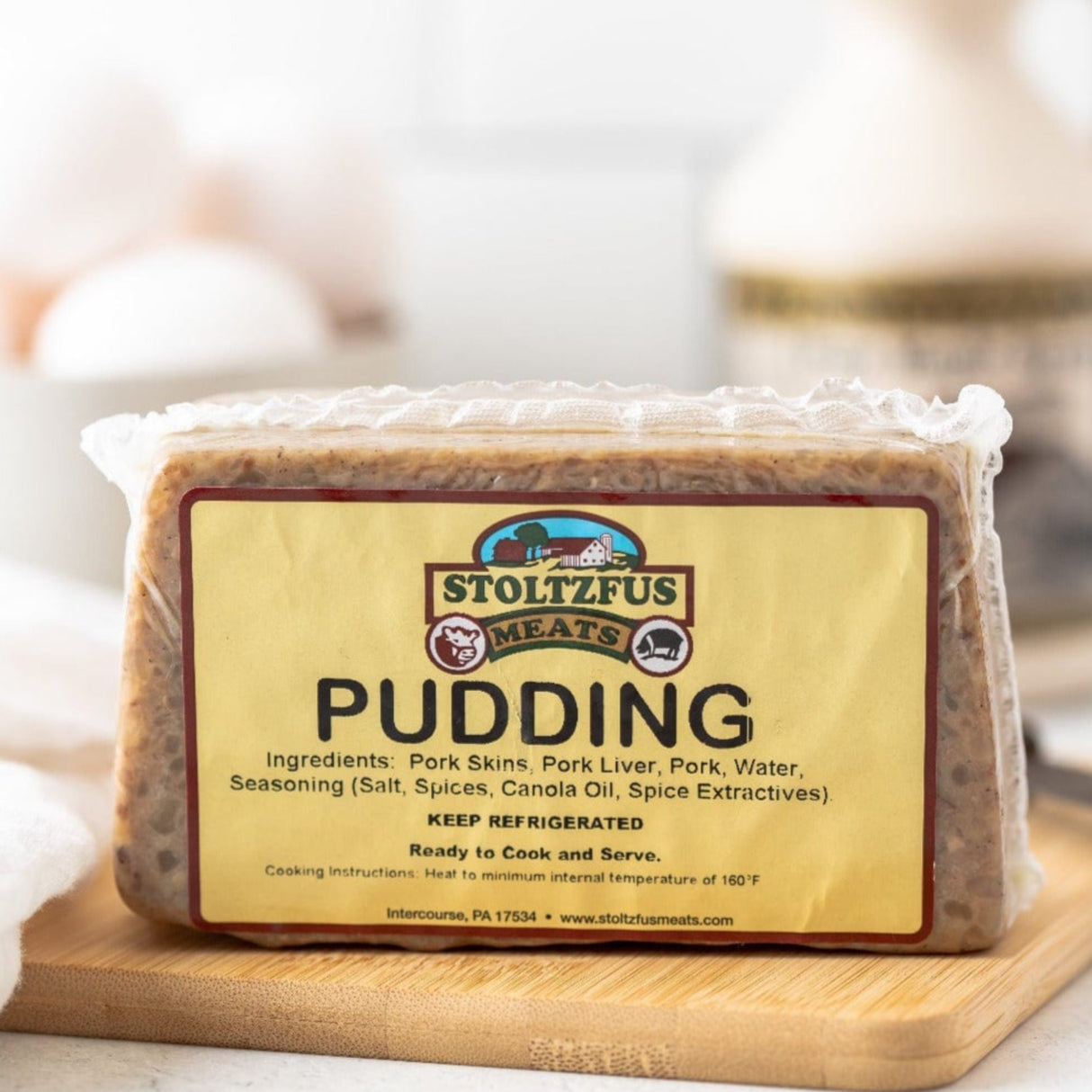 a package of pudding on a cutting board