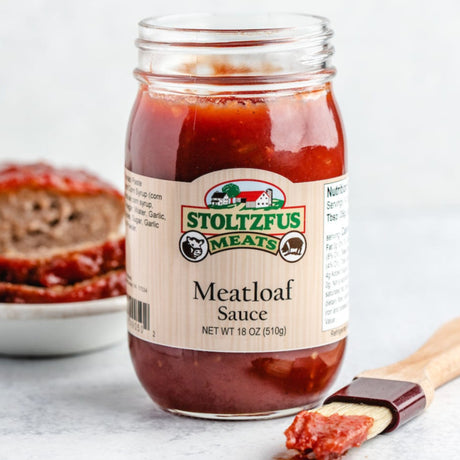 An open jar of meatloaf sauce