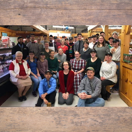 A group of market employees ready for the work day at Stoltzfus Meats of New Castle