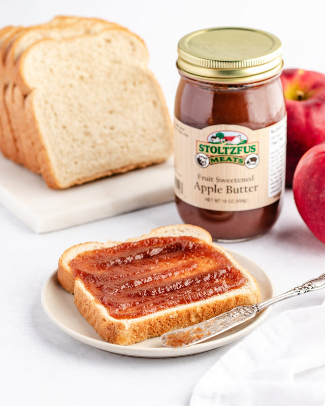 Apple butter spread upon a piece of bread