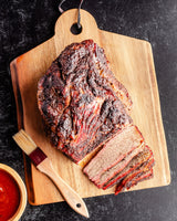 sliced brisket on a cutting board