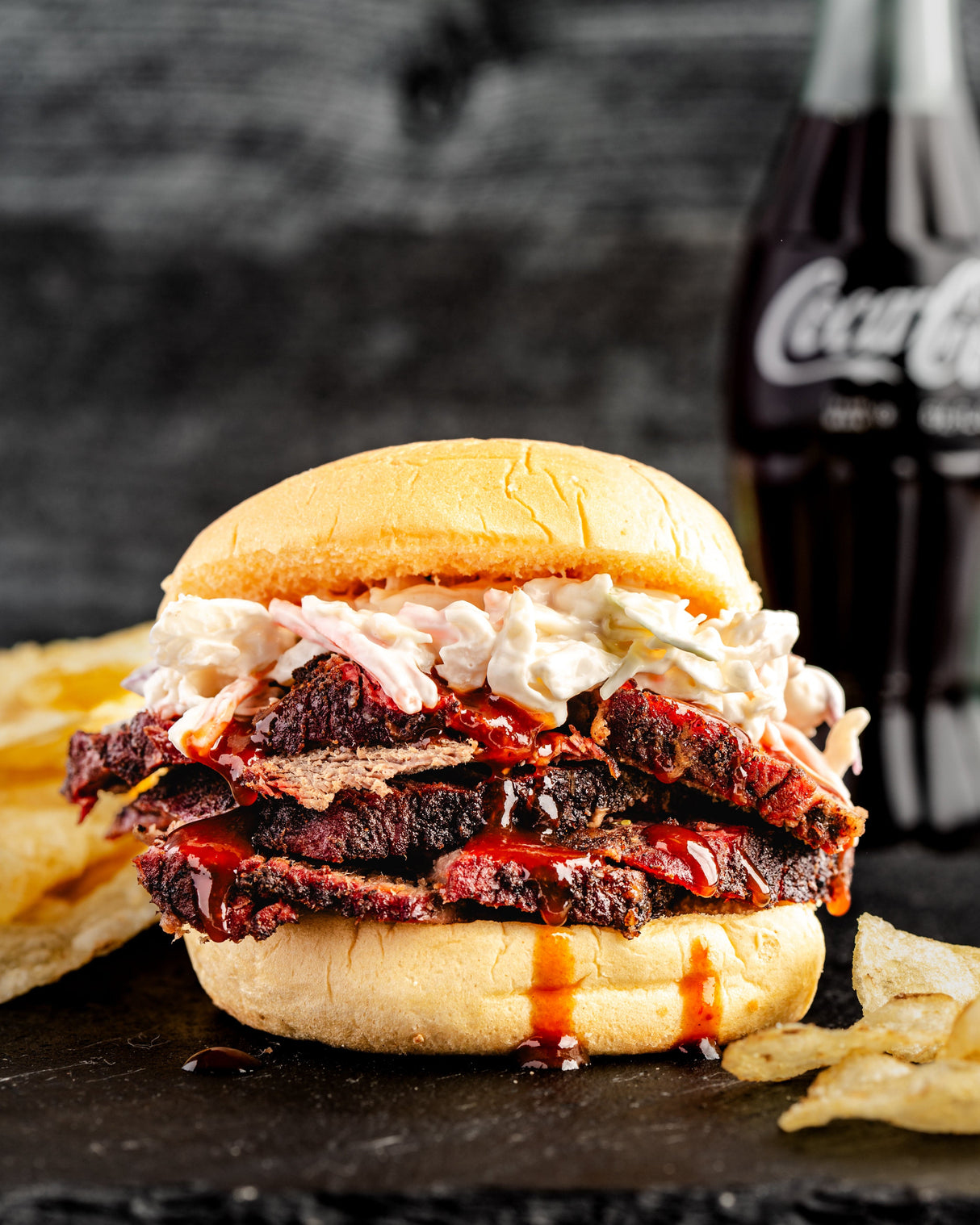 a smoked brisket sandwich with cole slaw