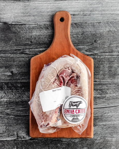 beef tongue on a cutting board