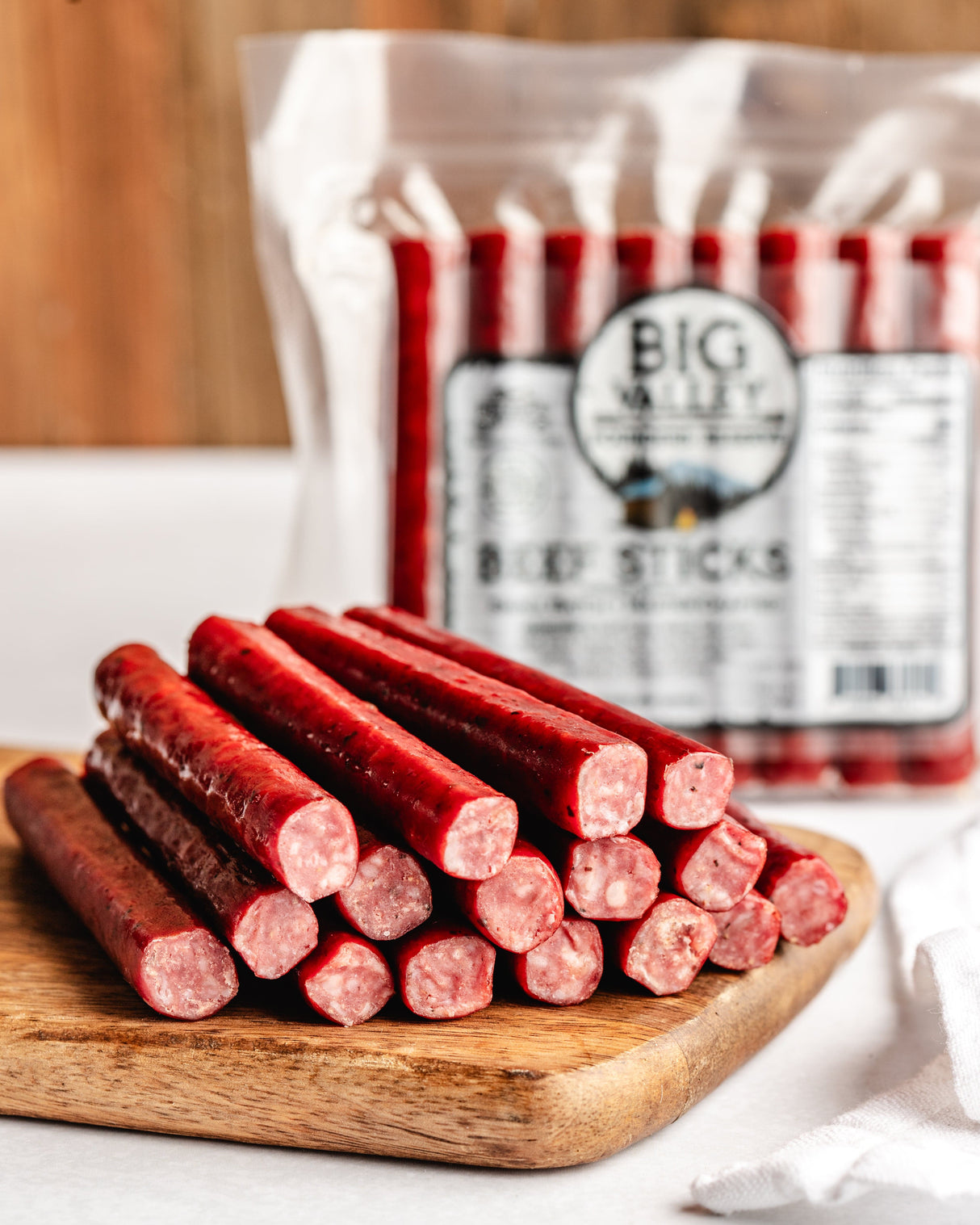 beef snack sticks on a cutting board