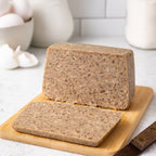 a slice of pan pudding on a cutting board